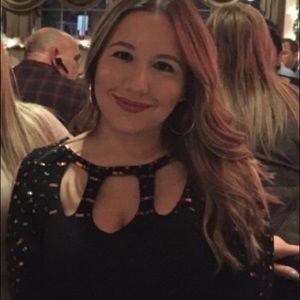 Sweater with beading and cutouts